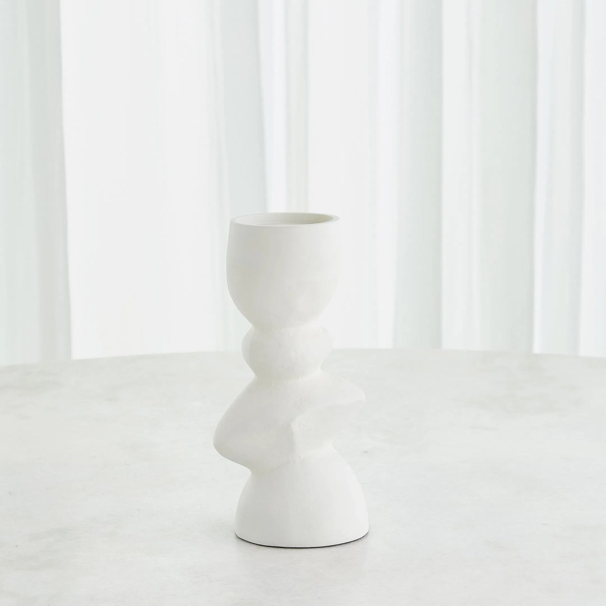 Pradier Candle Holder by Global Views in white. Made from aluminum in a modern style.