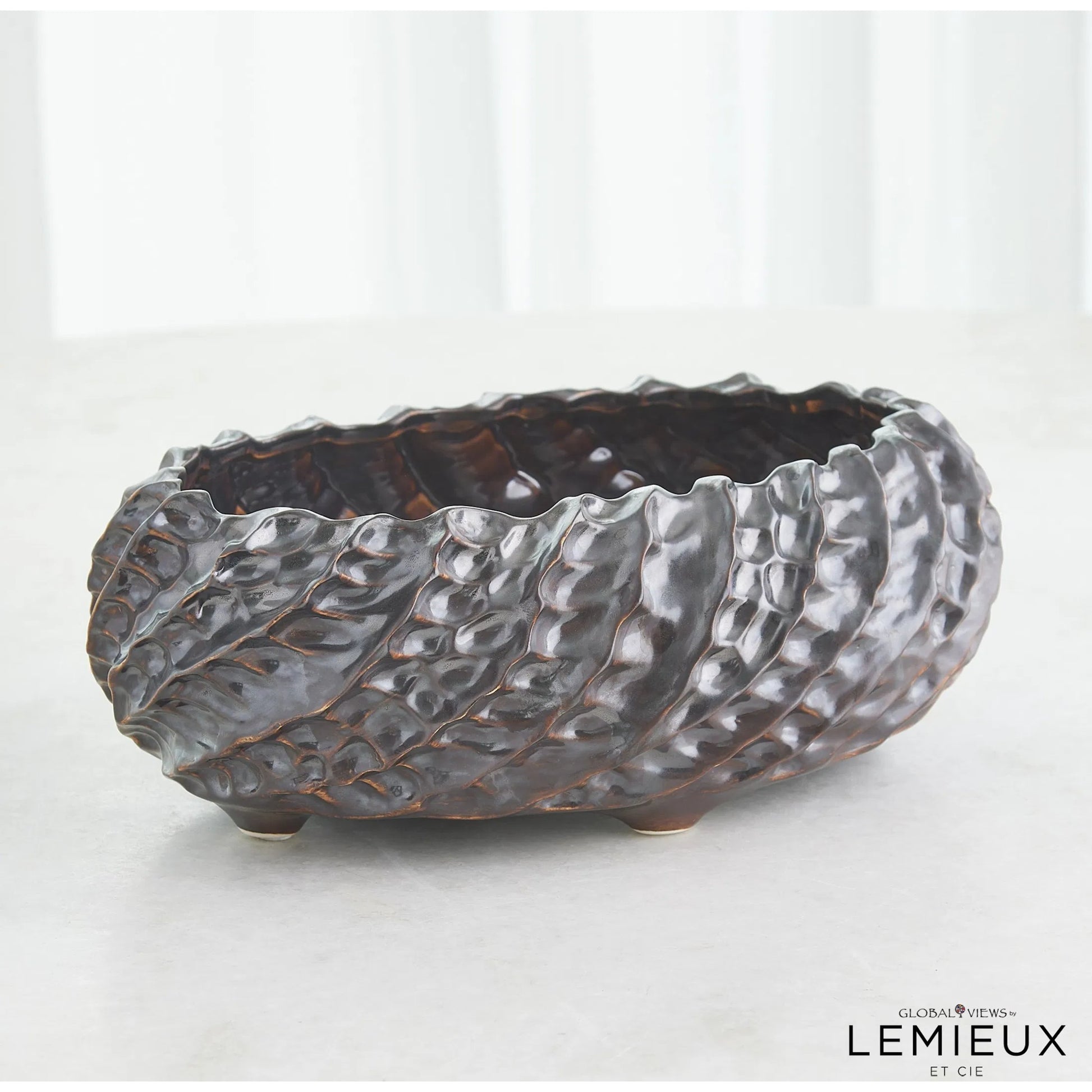 Cadoret Bowl by Global Views. Made from ceramic in a unique style.