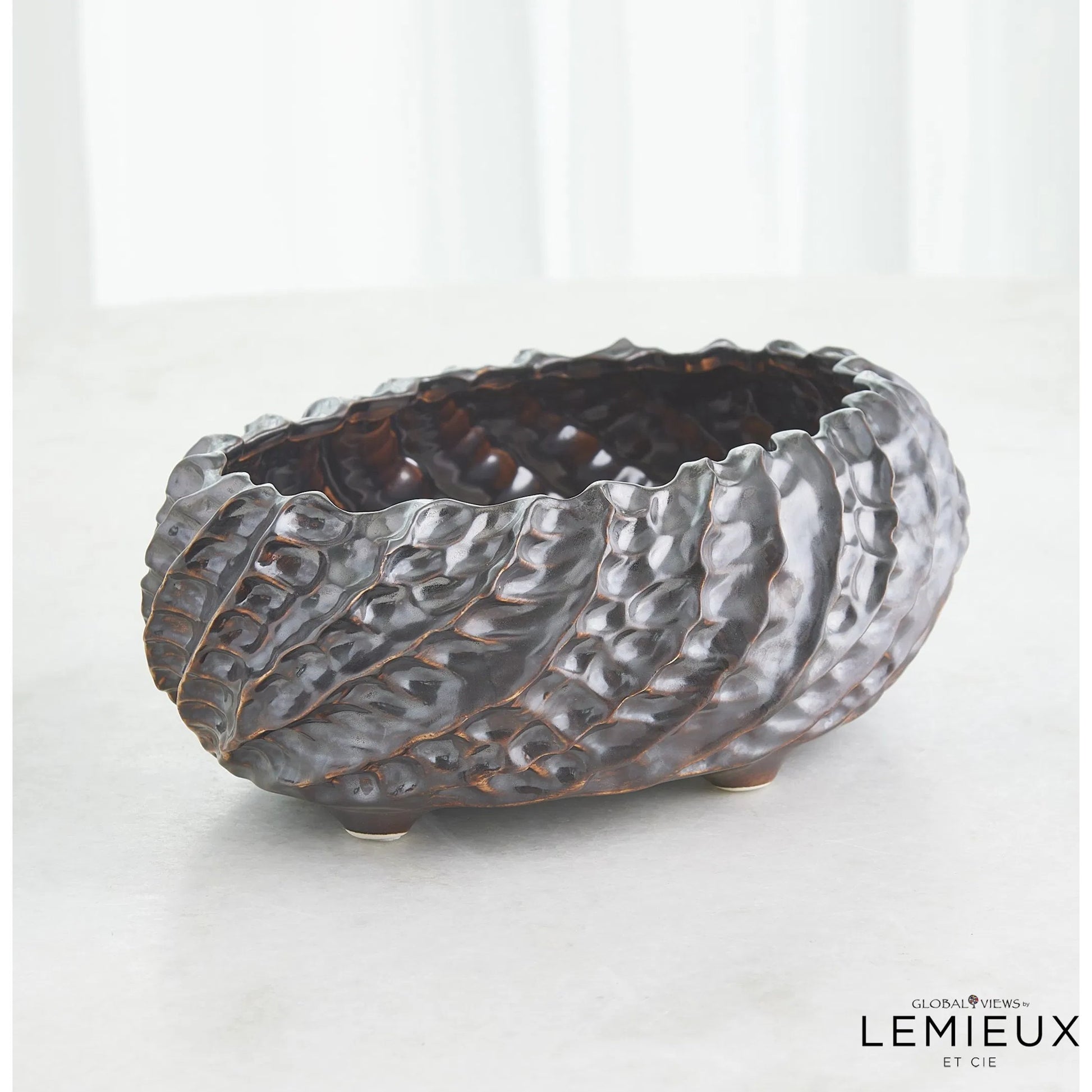 Cadoret Bowl by Global Views. Made from ceramic in a unique style.