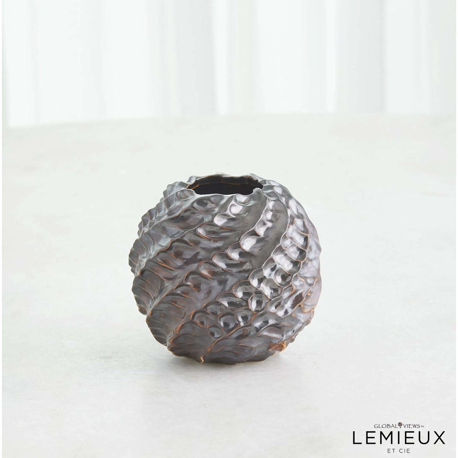 Cadoret Vase by Global Views. Made from ceramic in a unique style.