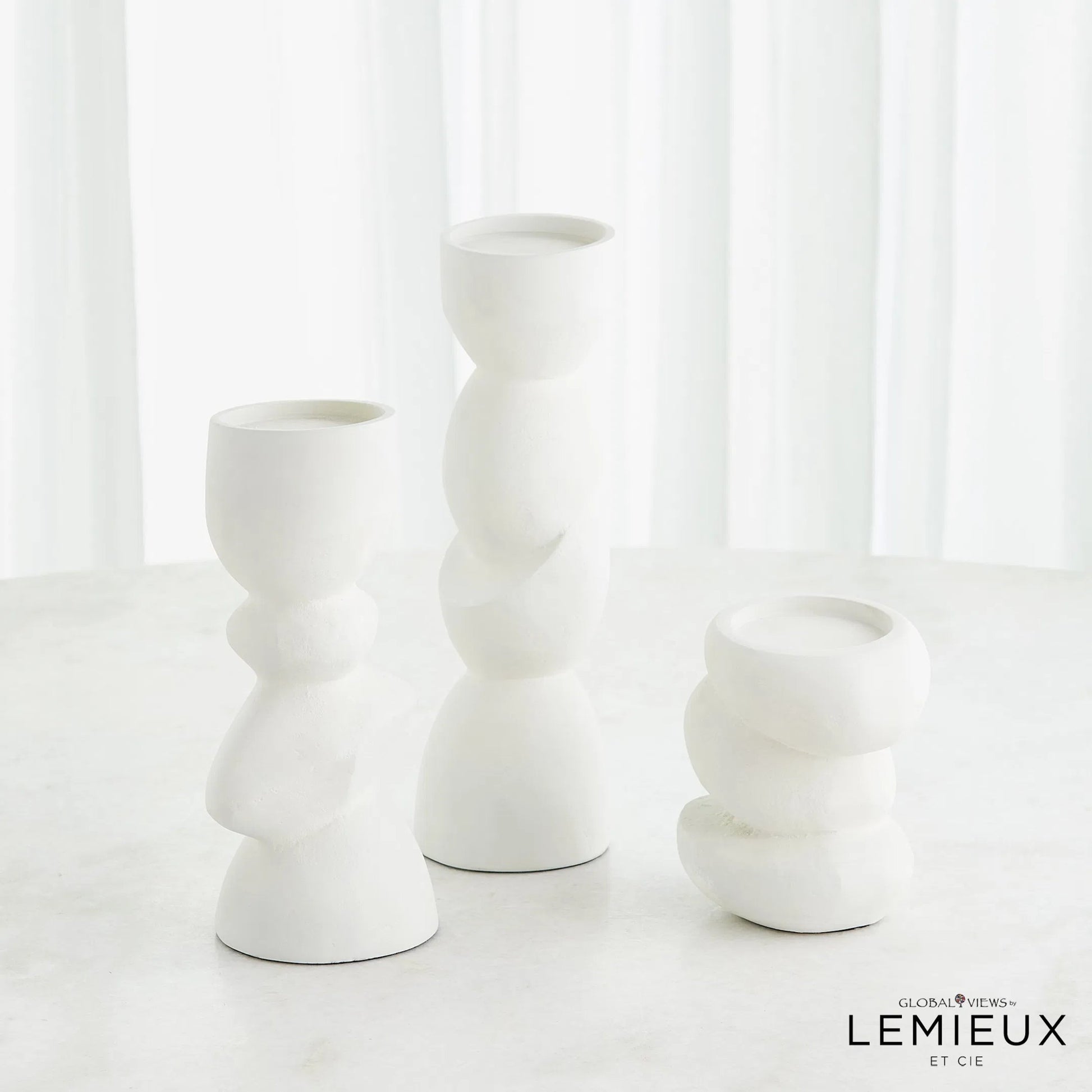 Pradier Candle Holder by Global Views in white. Made from aluminum in a modern style.