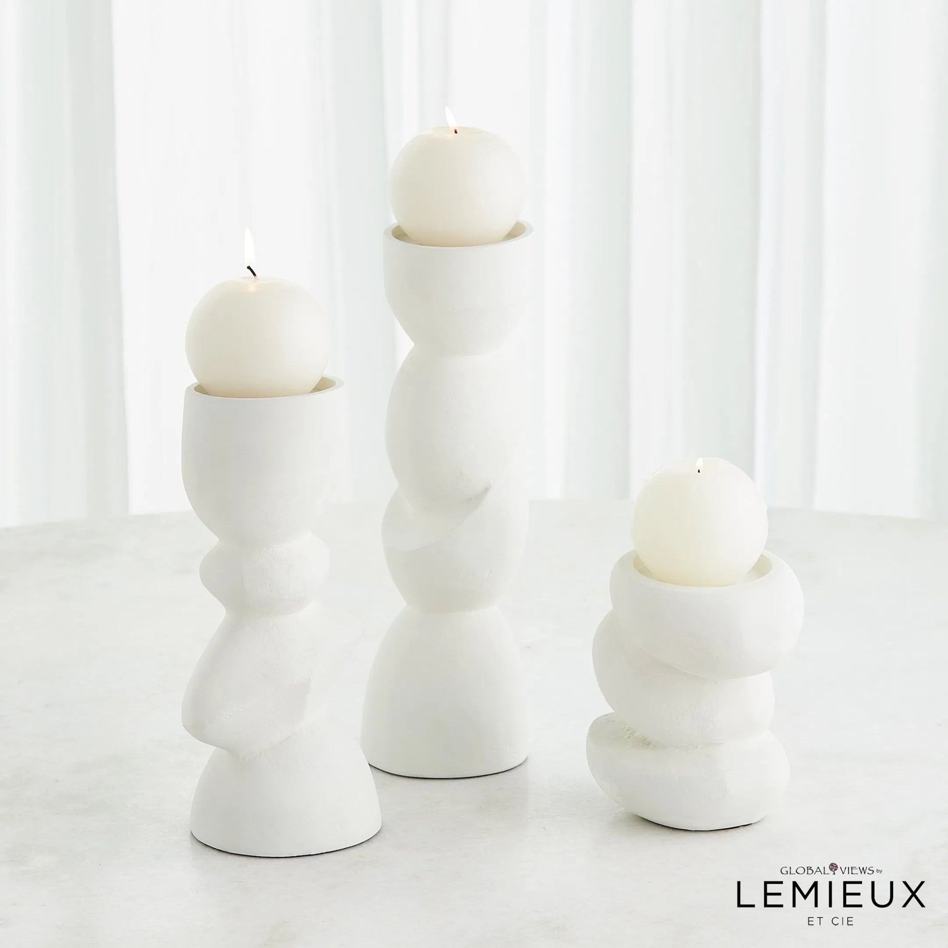 Pradier Candle Holder by Global Views in white. Made from aluminum in a modern style.
