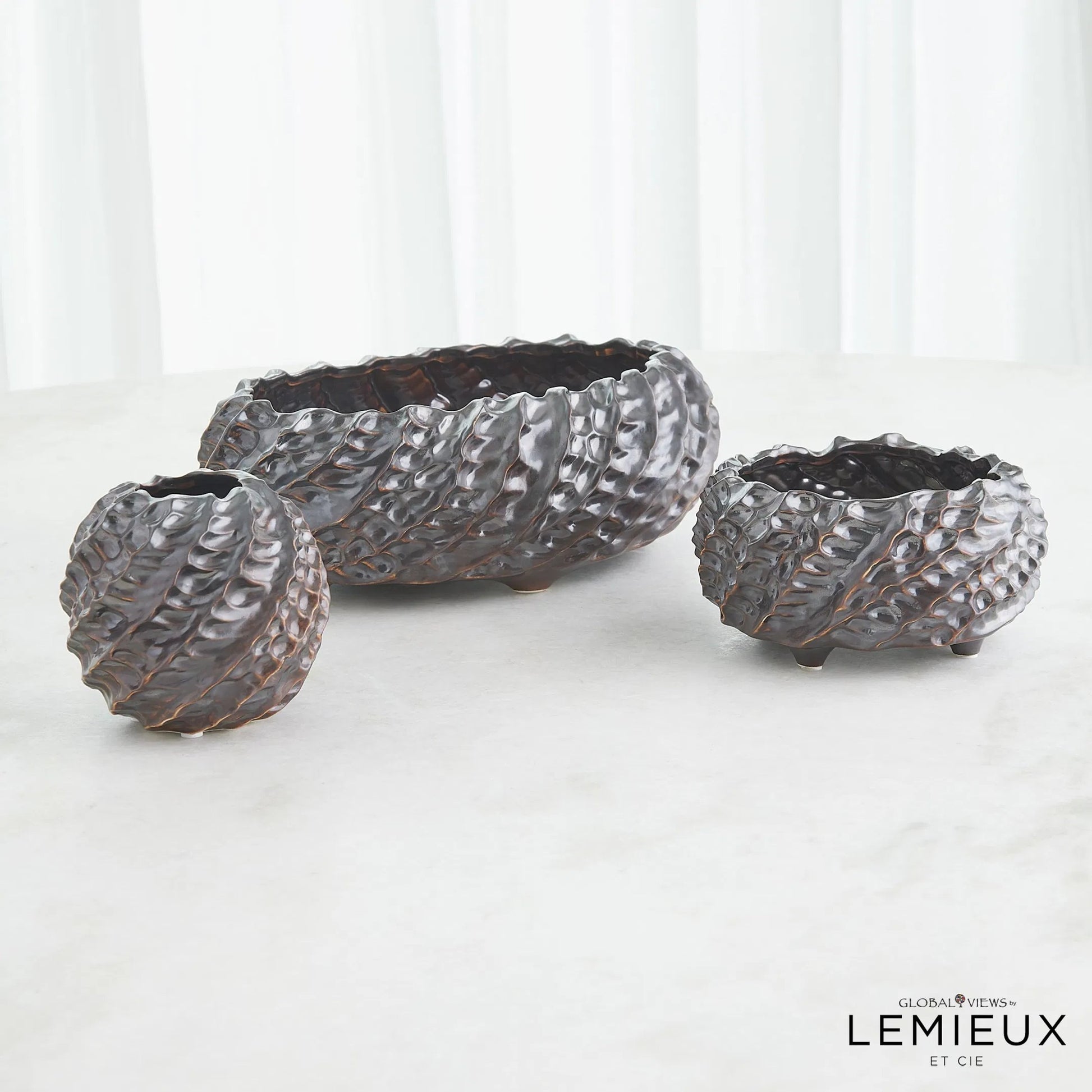 Cadoret Bowl by Global Views. Made from ceramic in a unique style.