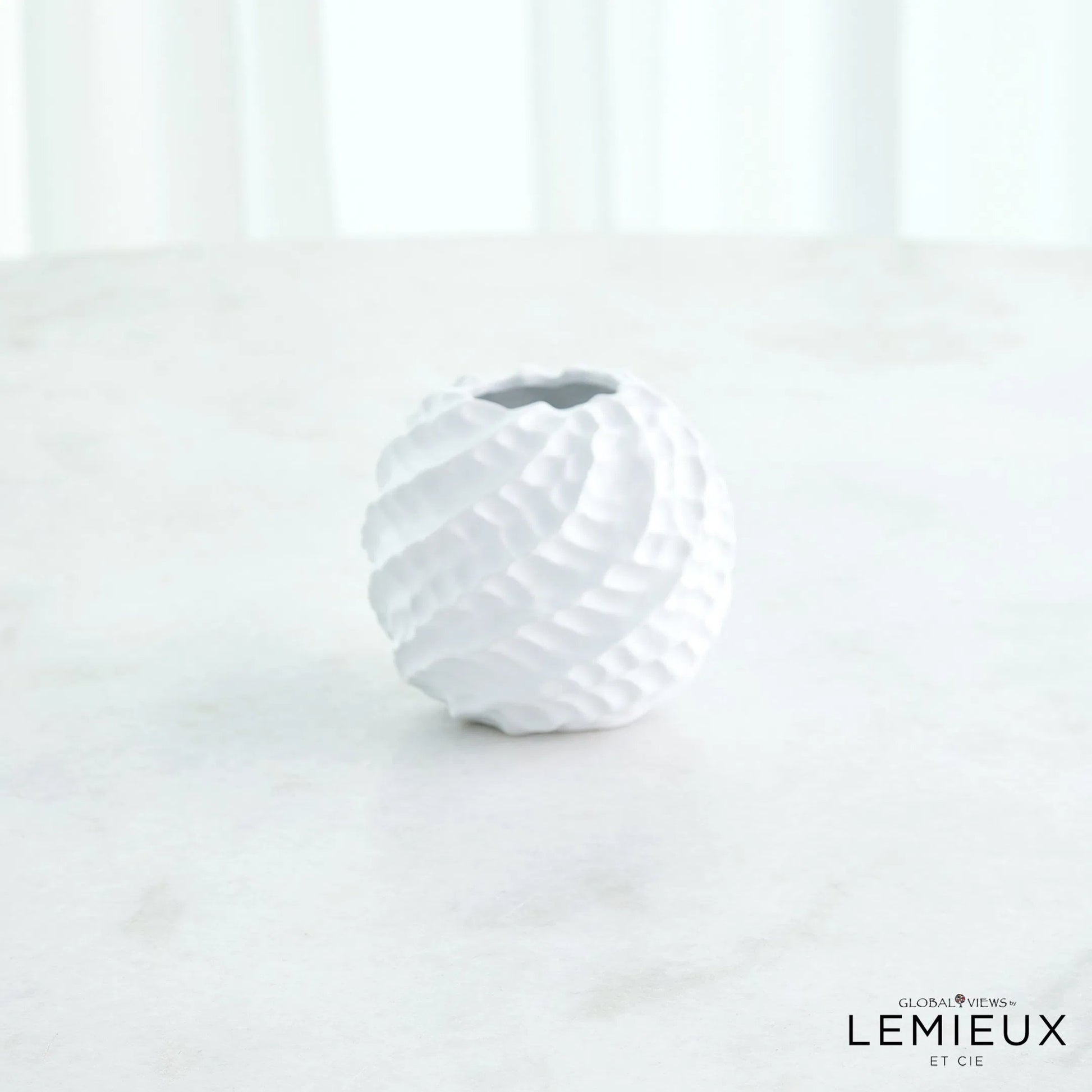 Cadoret Vase by Global Views. Made from ceramic in a unique style.
