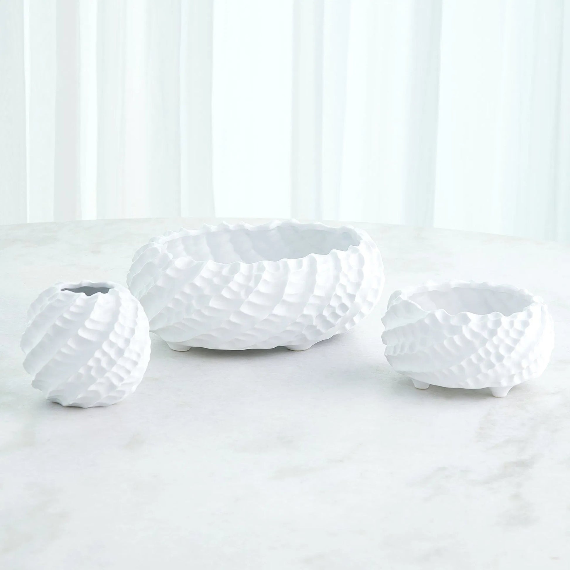 Cadoret Bowl by Global Views. Made from ceramic in a unique style.