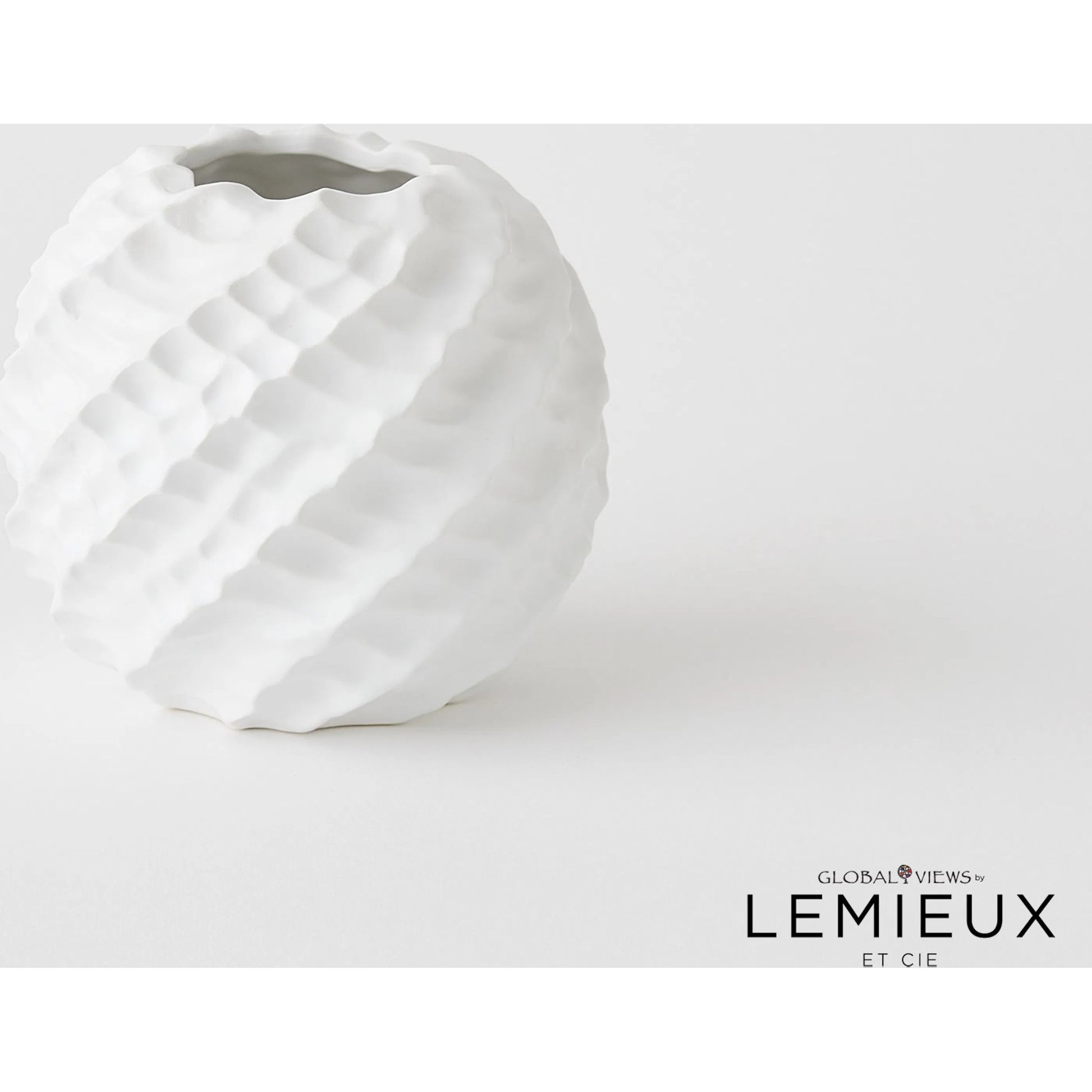Cadoret Vase by Global Views. Made from ceramic in a unique style.