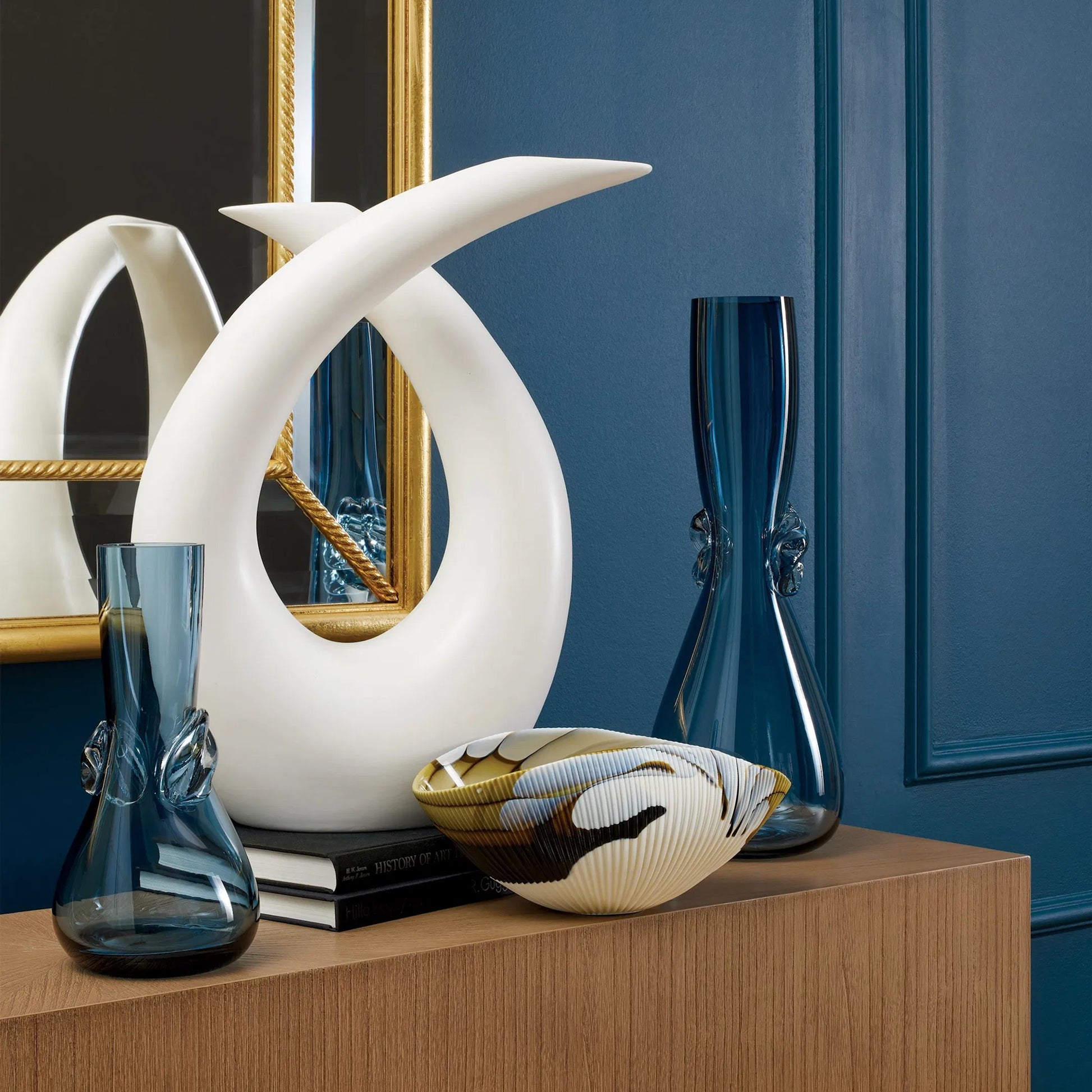 Loop Sculpture by Global Views. Made from ceramic in a modern style.