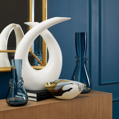 Loop Sculpture by Global Views. Made from ceramic in a modern style.