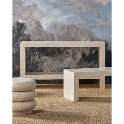 Carson Console Table by Currey and Company in ivory terrazzo. Made from fiber concrete, stone, shell in a transitional style.