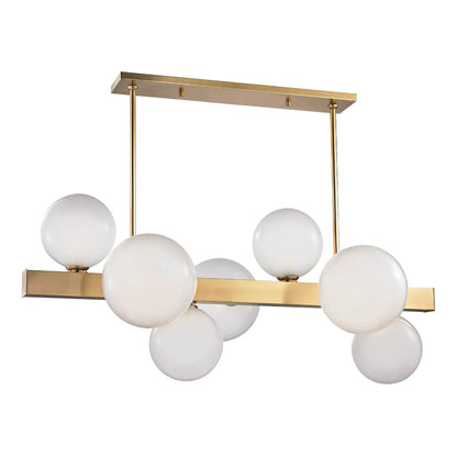 Hinsdale 7 Light Island by Hudson Valley. Made from brass in a modern style.