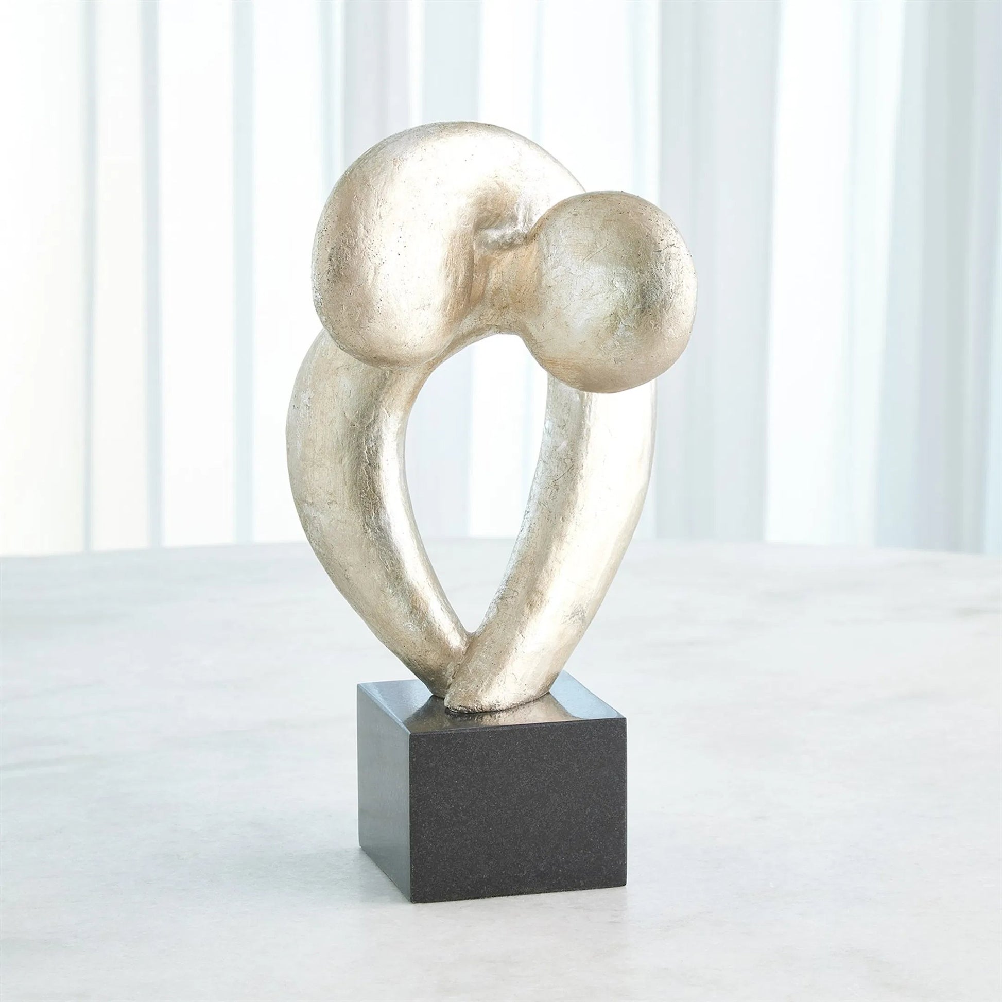 Align Sculpture by Global Views. Made from cast iron, marble in a modern style.