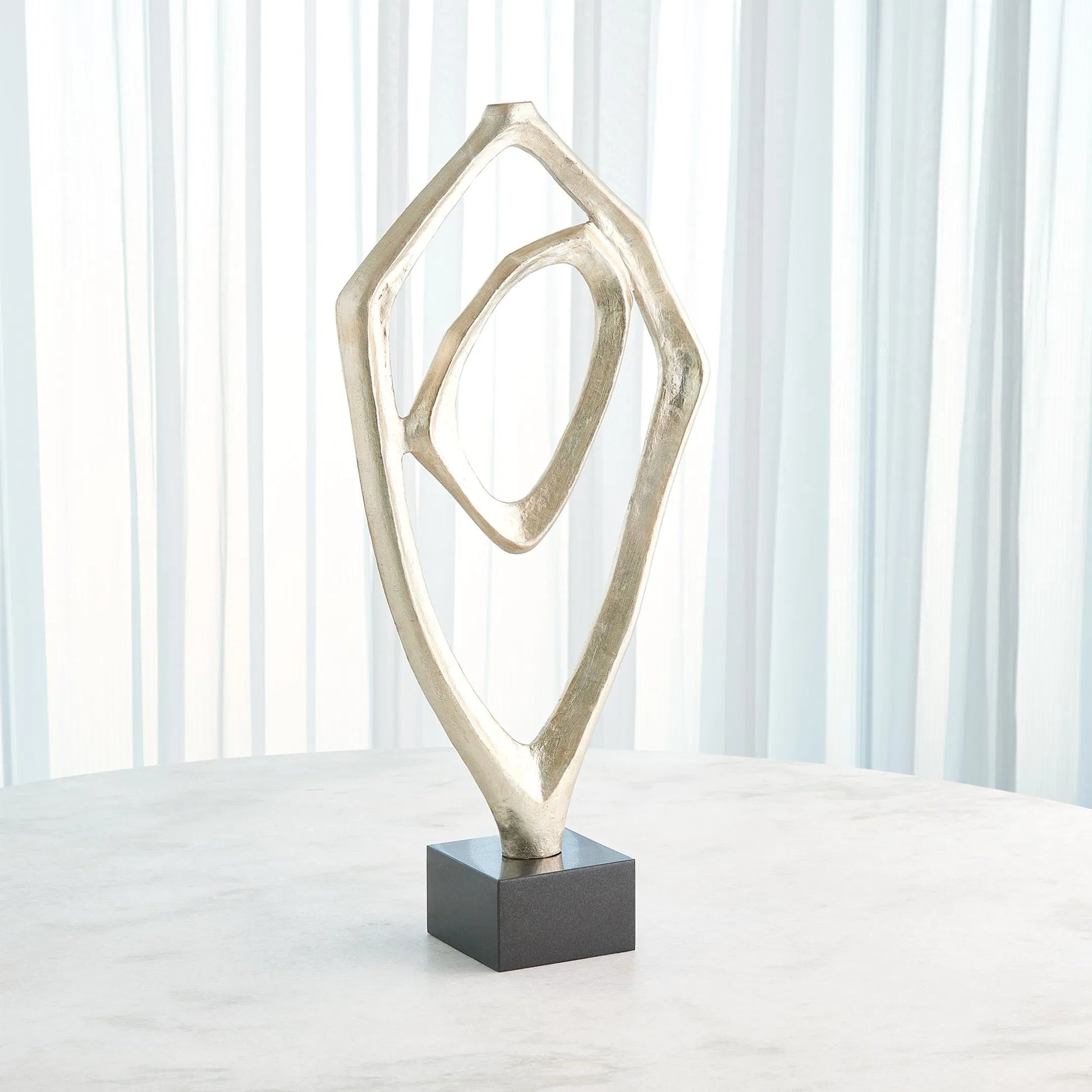 Interplay Sculpture by Global Views in marble. Made from unique in a modern style.