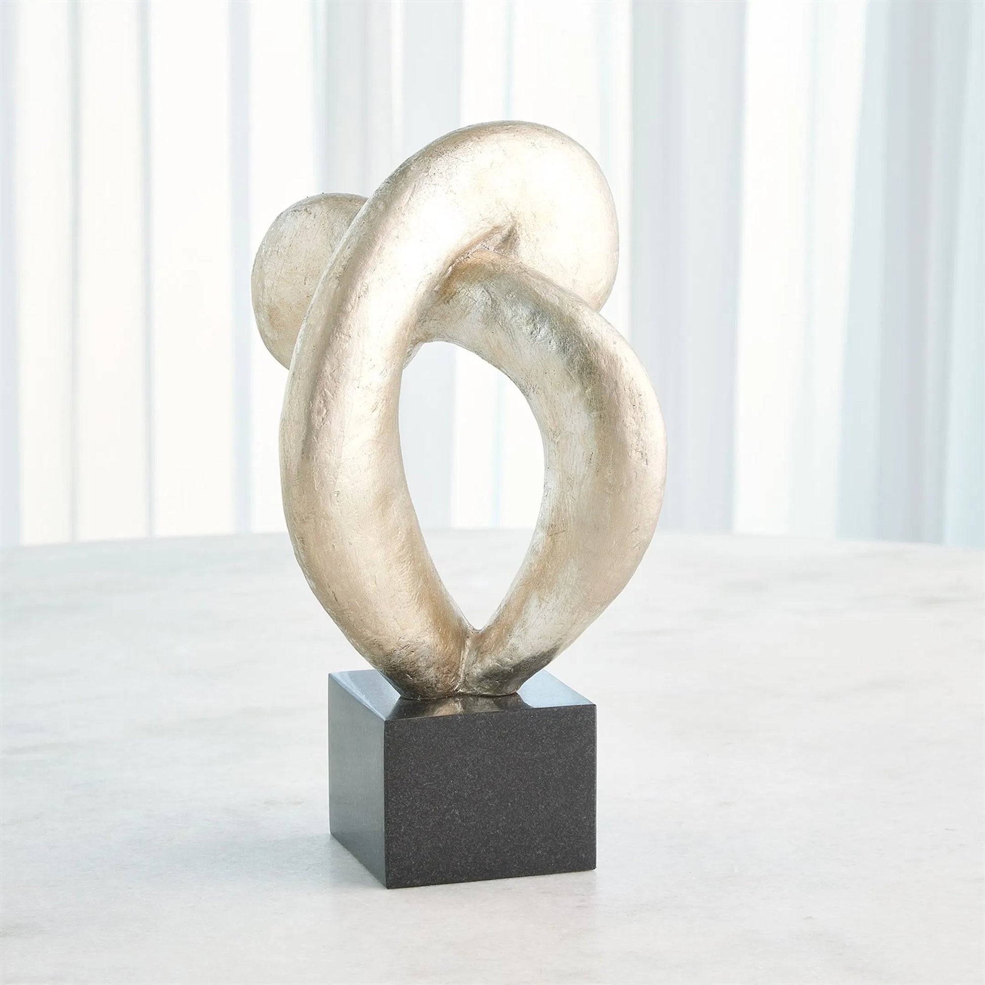 Align Sculpture by Global Views. Made from cast iron, marble in a modern style.