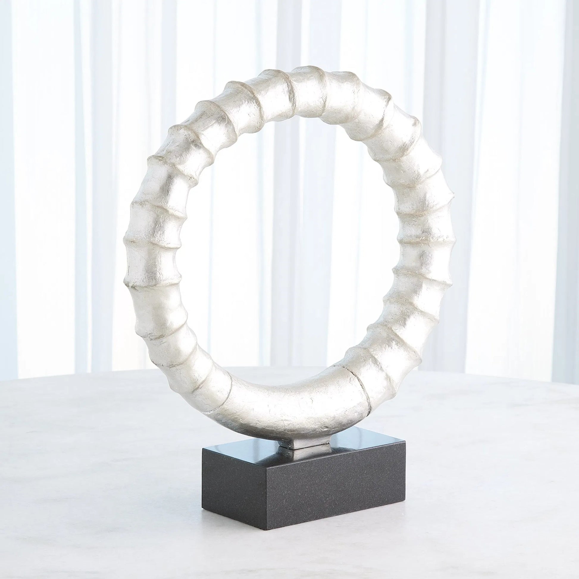 Infinity Horn Sculpture by Global Views in marble. Made from unique in a modern style.