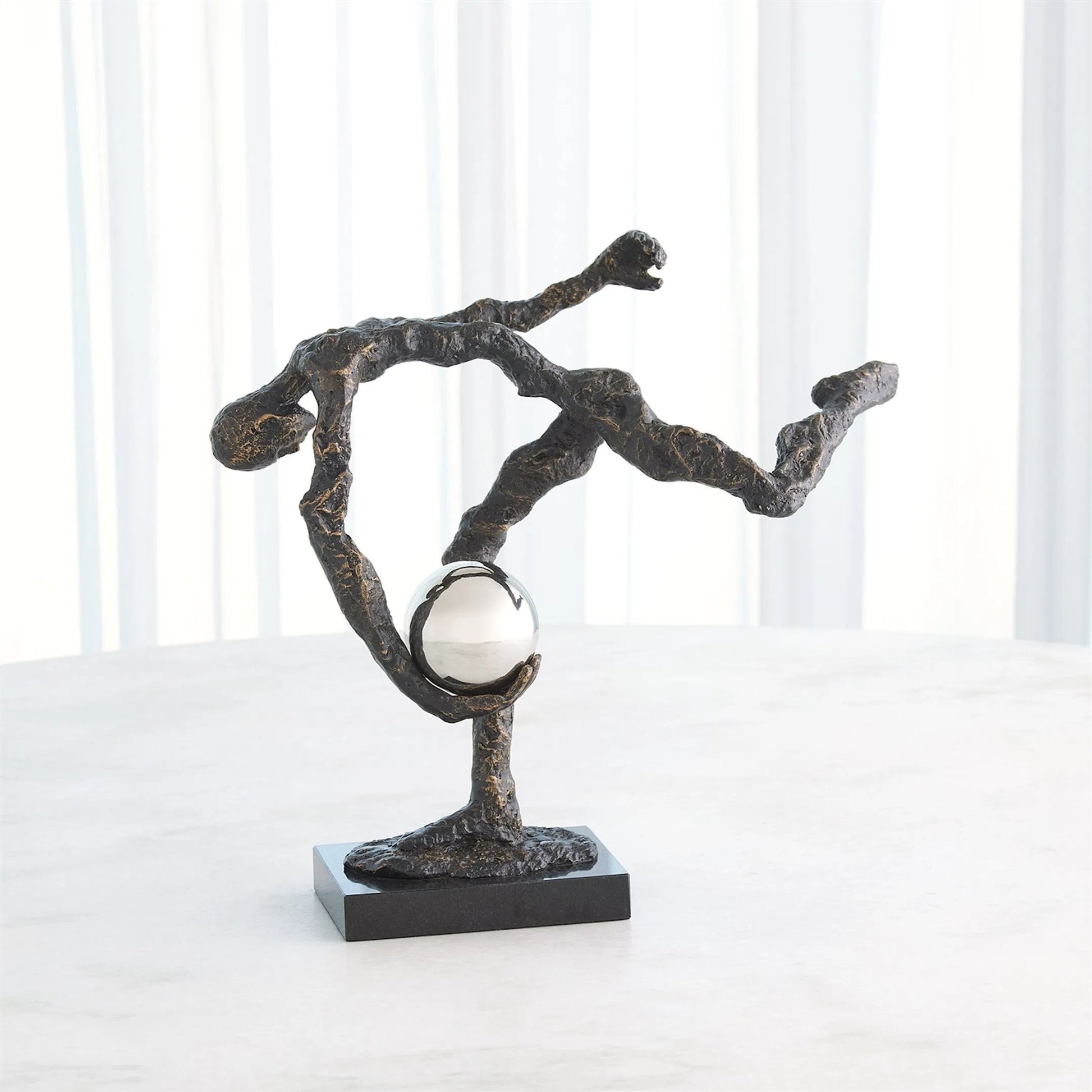 Tripped Up Sculpture by Global Views. Made from unique in a modern style.