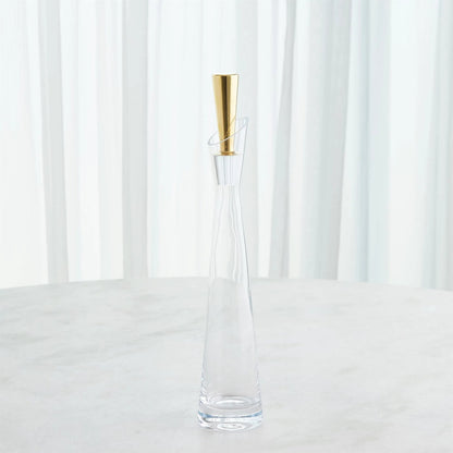 Slant Decanter by Global Views. Made from glass in a transitional style.