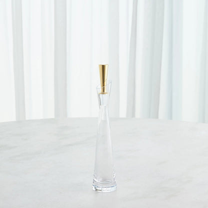 Slant Decanter by Global Views. Made from glass in a transitional style.