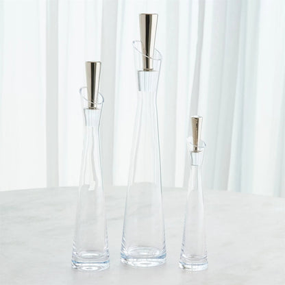 Slant Decanter by Global Views. Made from glass in a transitional style.