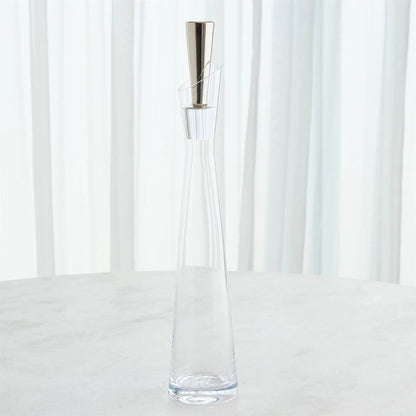Slant Decanter by Global Views. Made from glass in a transitional style.