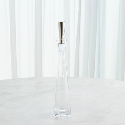Slant Decanter by Global Views. Made from glass in a transitional style.