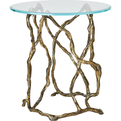 Twistwood Side Table by Global Views in antique brass. Made from cast iron, ultra clear tempered glass in a modern style.