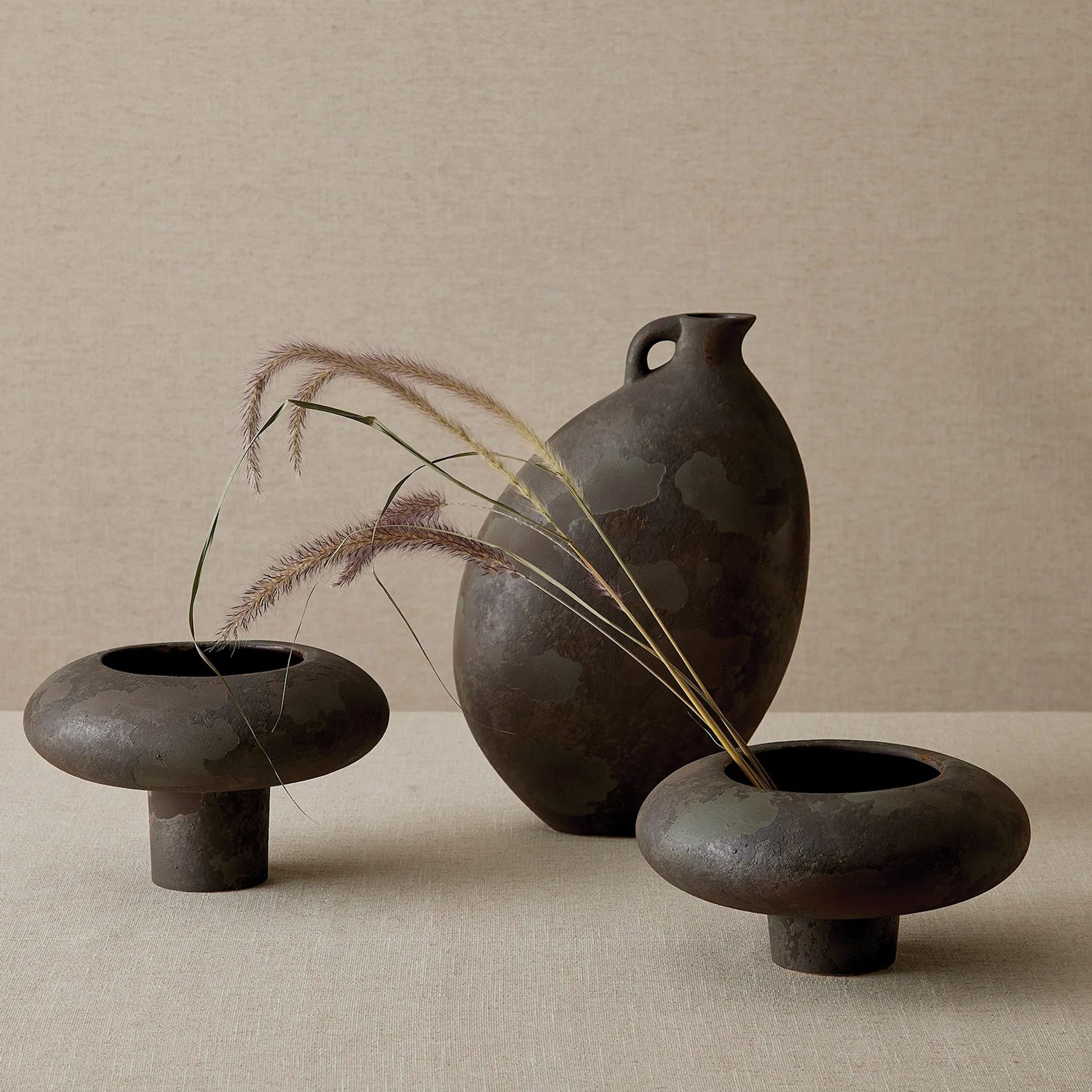 Cloud Bowl by Global Views in soot. Made from ceramic in a rustic style.
