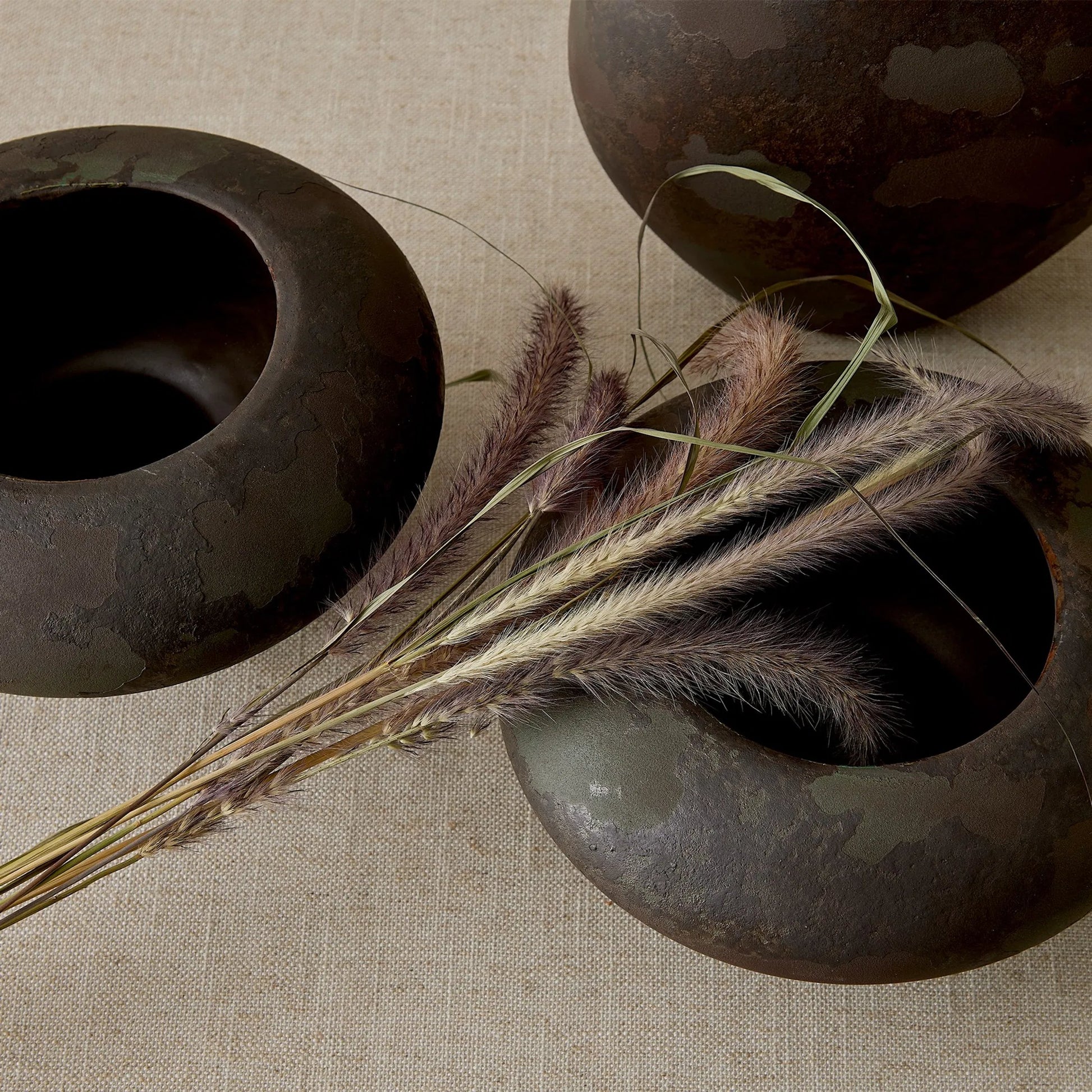 Cloud Bowl by Global Views in soot. Made from ceramic in a rustic style.