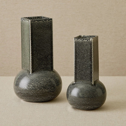 Crocus Vase by Global Views. Made from earthenware in a modern style.