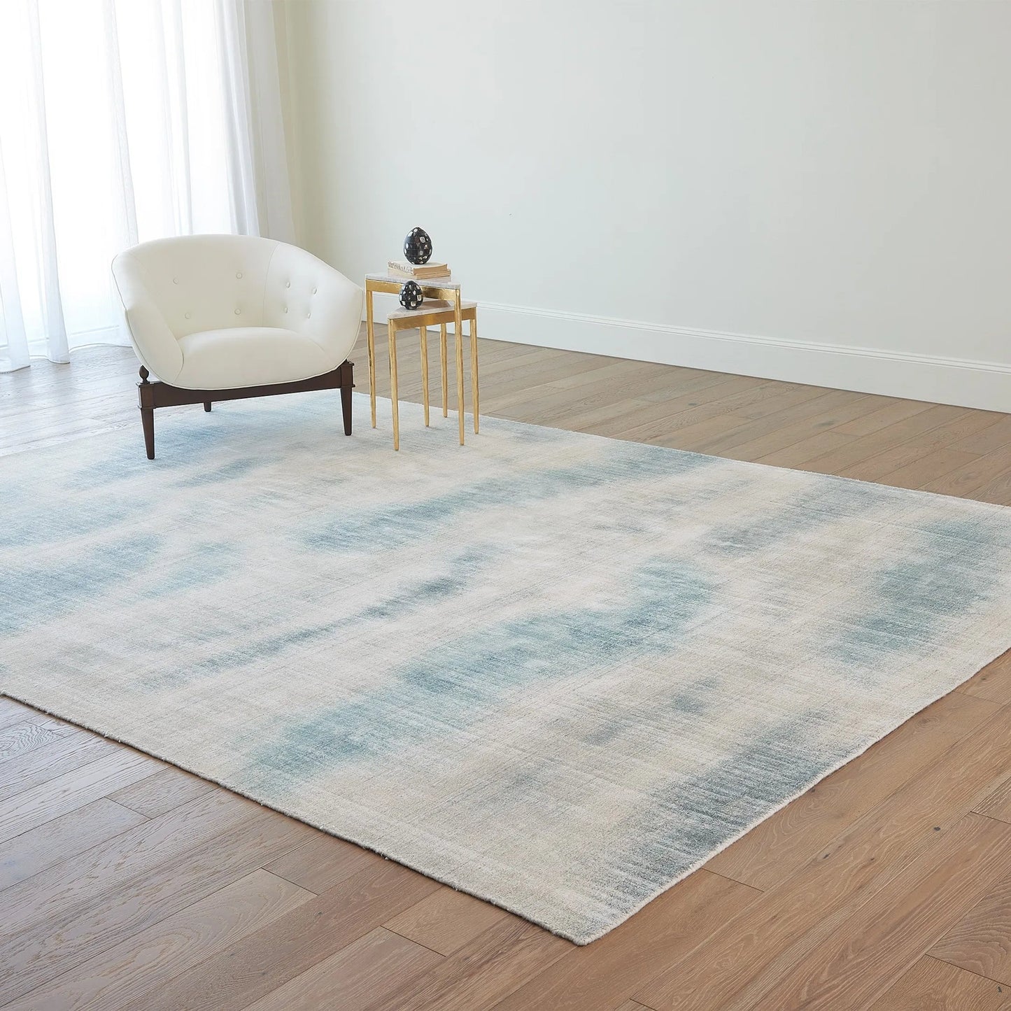 003 SI-2446270,SI-2446271,SI-2446272,SI-2446273,SI-2446274 | Lifestyle | Cloudy Day Rug by Global Views in natural. Made from 90% viscose, 10% wool in a unique style.