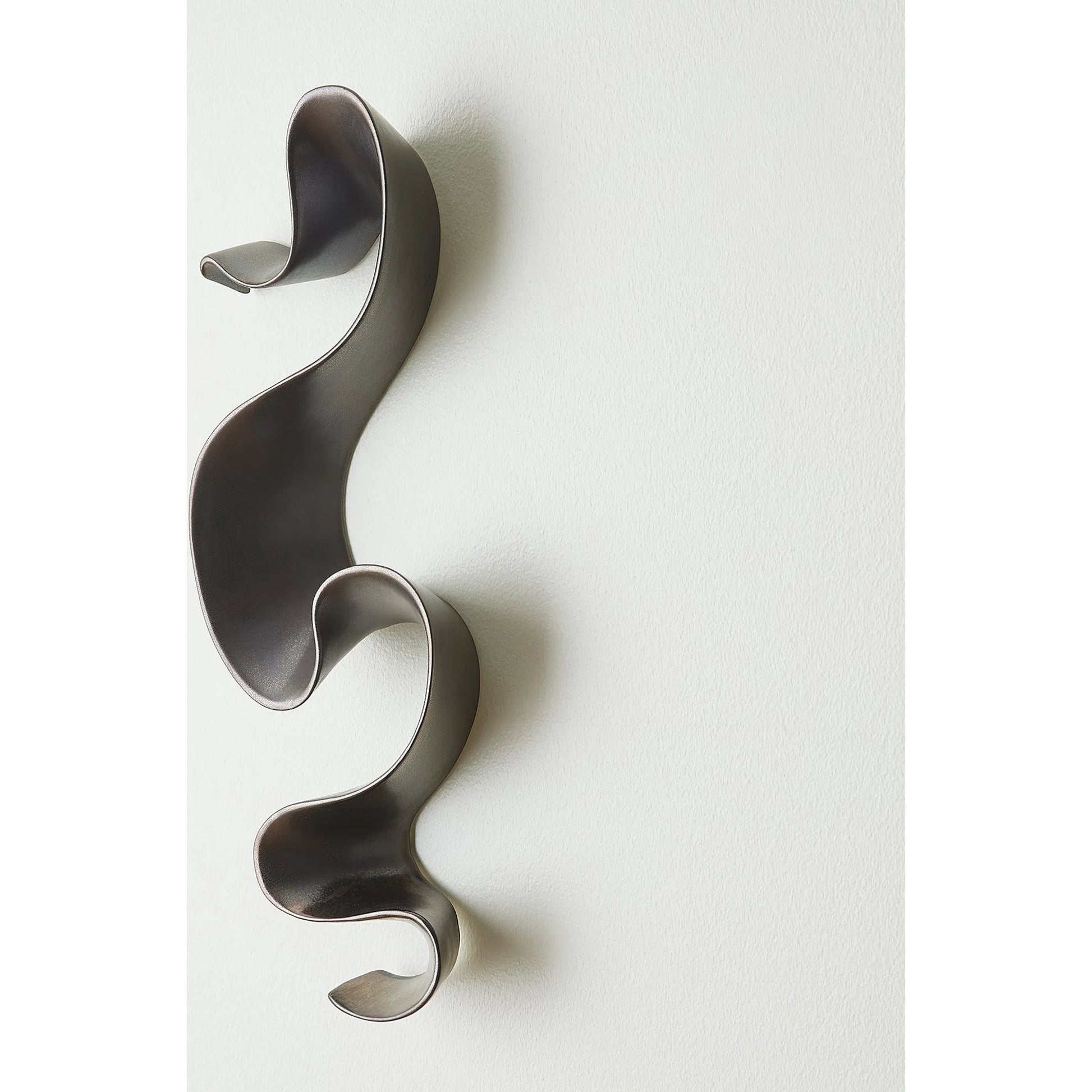 Tempest Wall Ribbon by Global Views. Made from ceramic in a modern style.