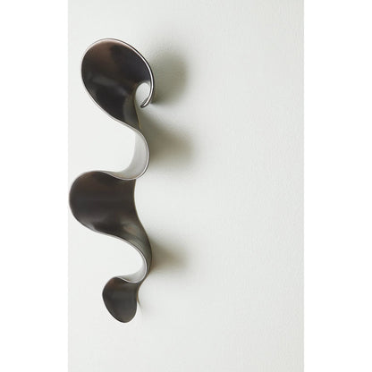 Tempest Wall Ribbon by Global Views. Made from ceramic in a modern style.
