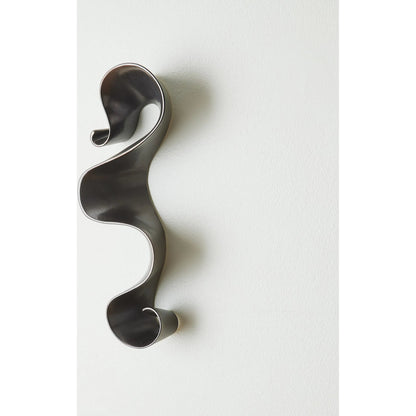 Tempest Wall Ribbon by Global Views. Made from ceramic in a modern style.