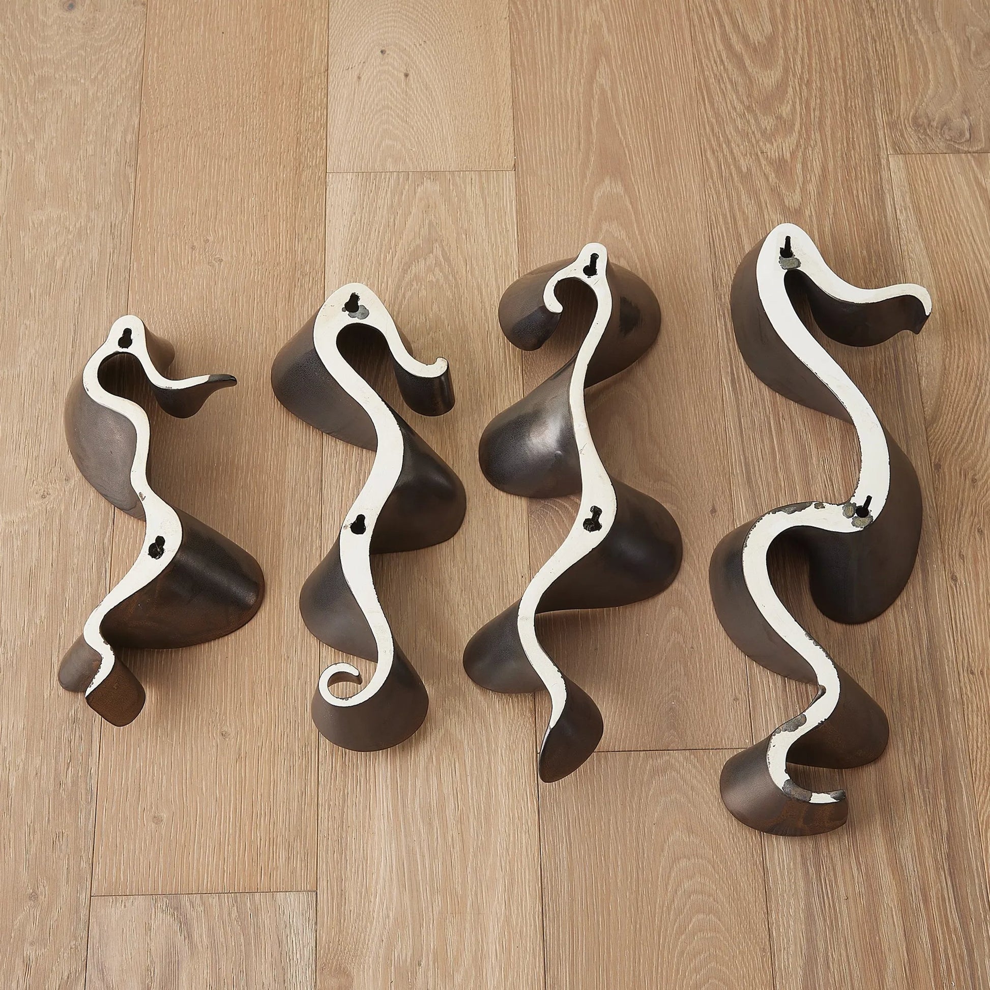 Tempest Wall Ribbon by Global Views. Made from ceramic in a modern style.