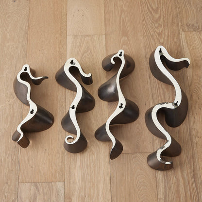 Tempest Wall Ribbon by Global Views. Made from ceramic in a modern style.
