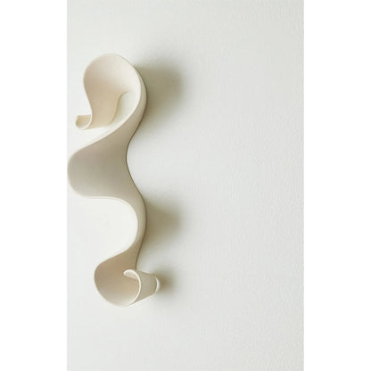 Tempest Wall Ribbon by Global Views. Made from ceramic in a modern style.