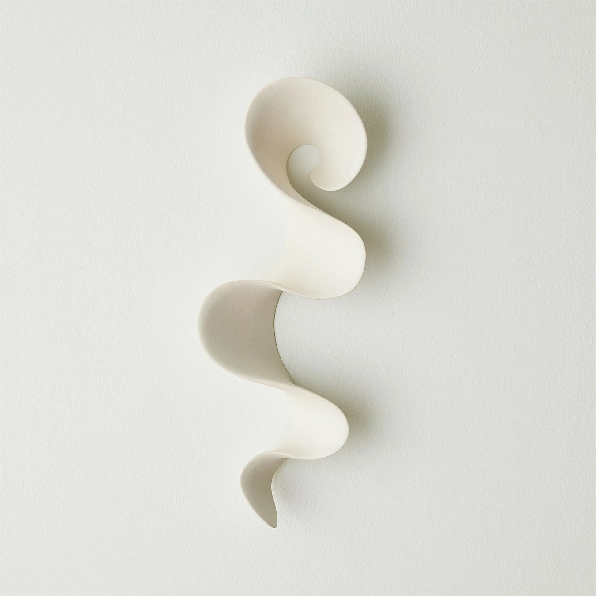 Tempest Wall Ribbon by Global Views. Made from ceramic in a modern style.