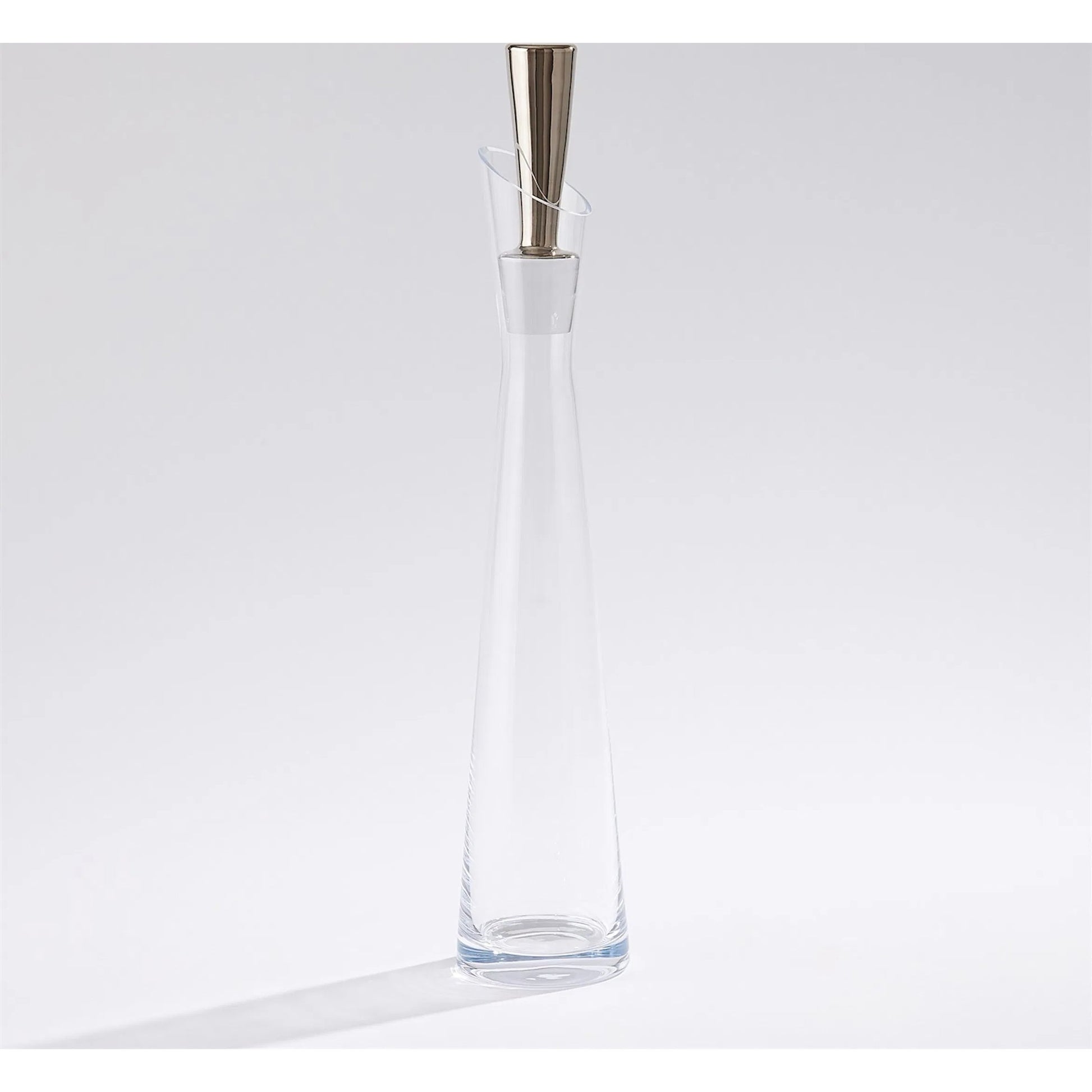 Slant Decanter by Global Views. Made from glass in a transitional style.