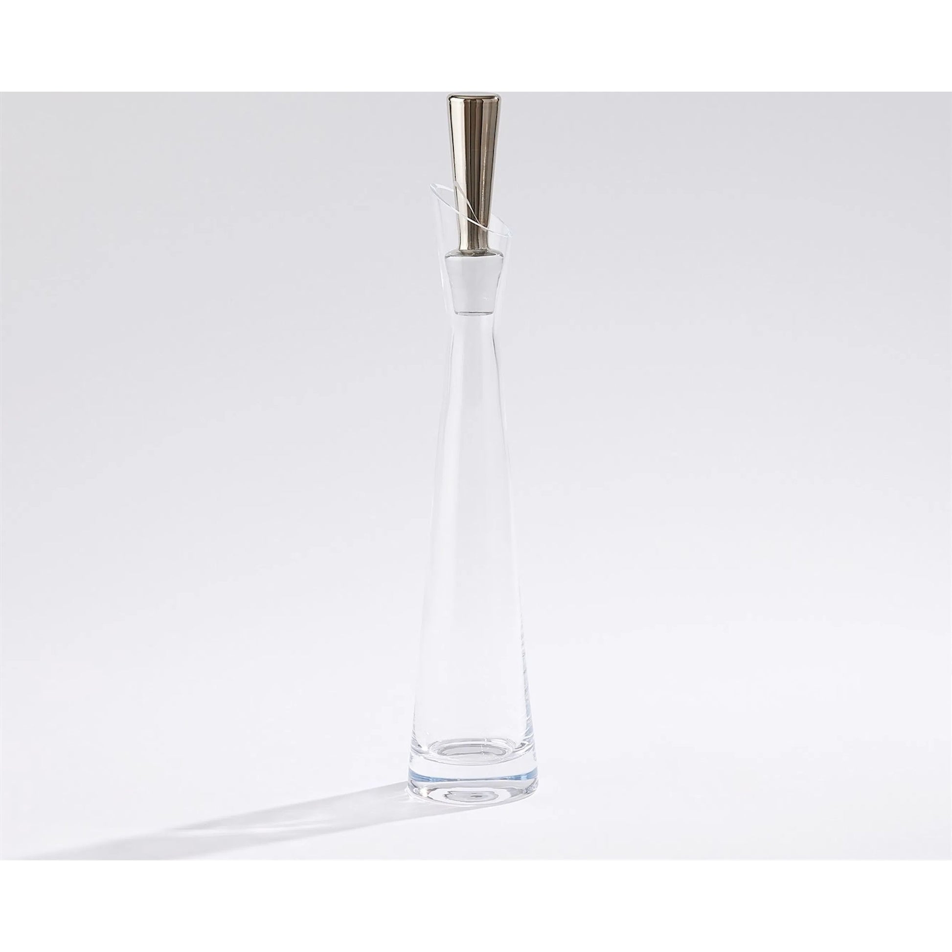 Slant Decanter by Global Views. Made from glass in a transitional style.