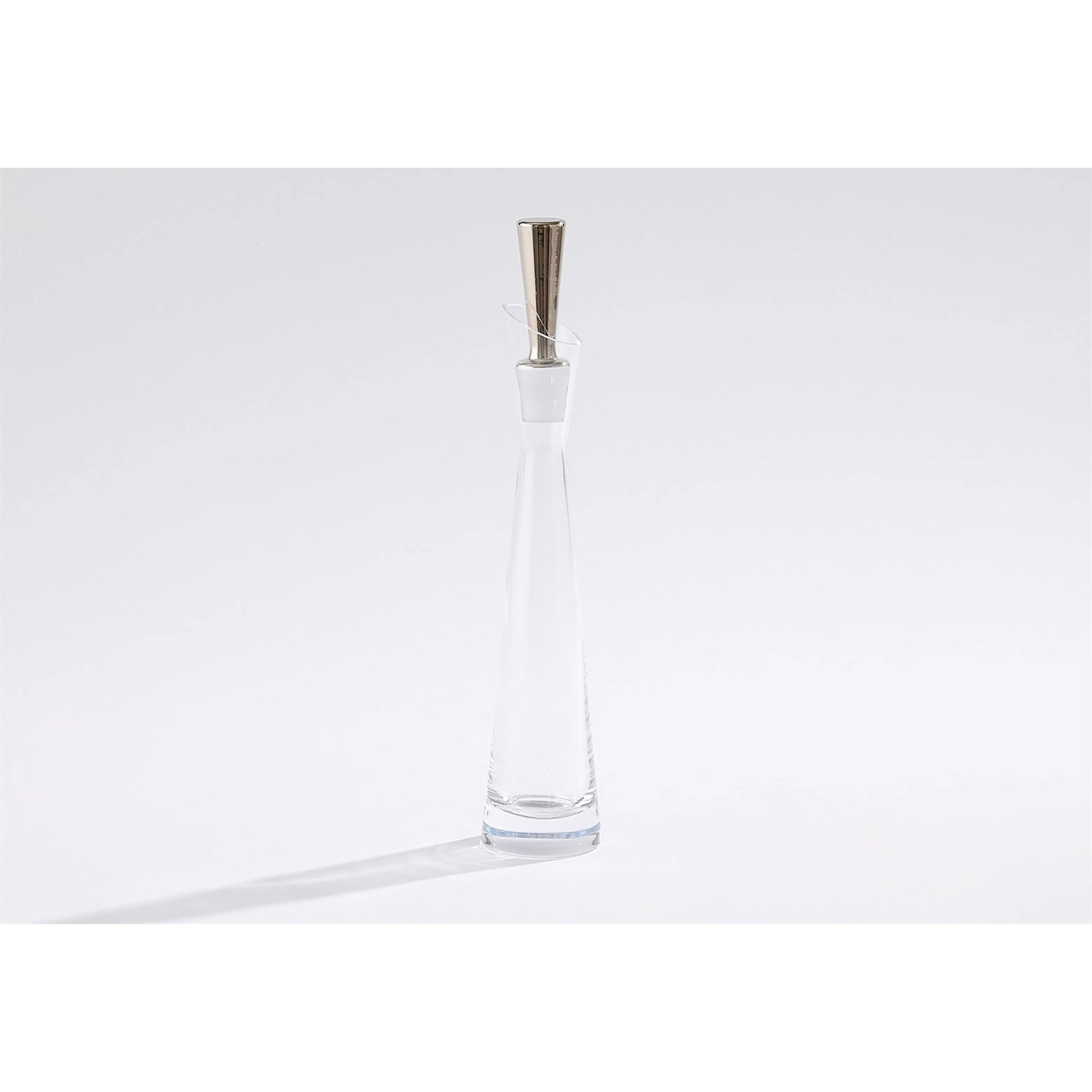 Slant Decanter by Global Views. Made from glass in a transitional style.