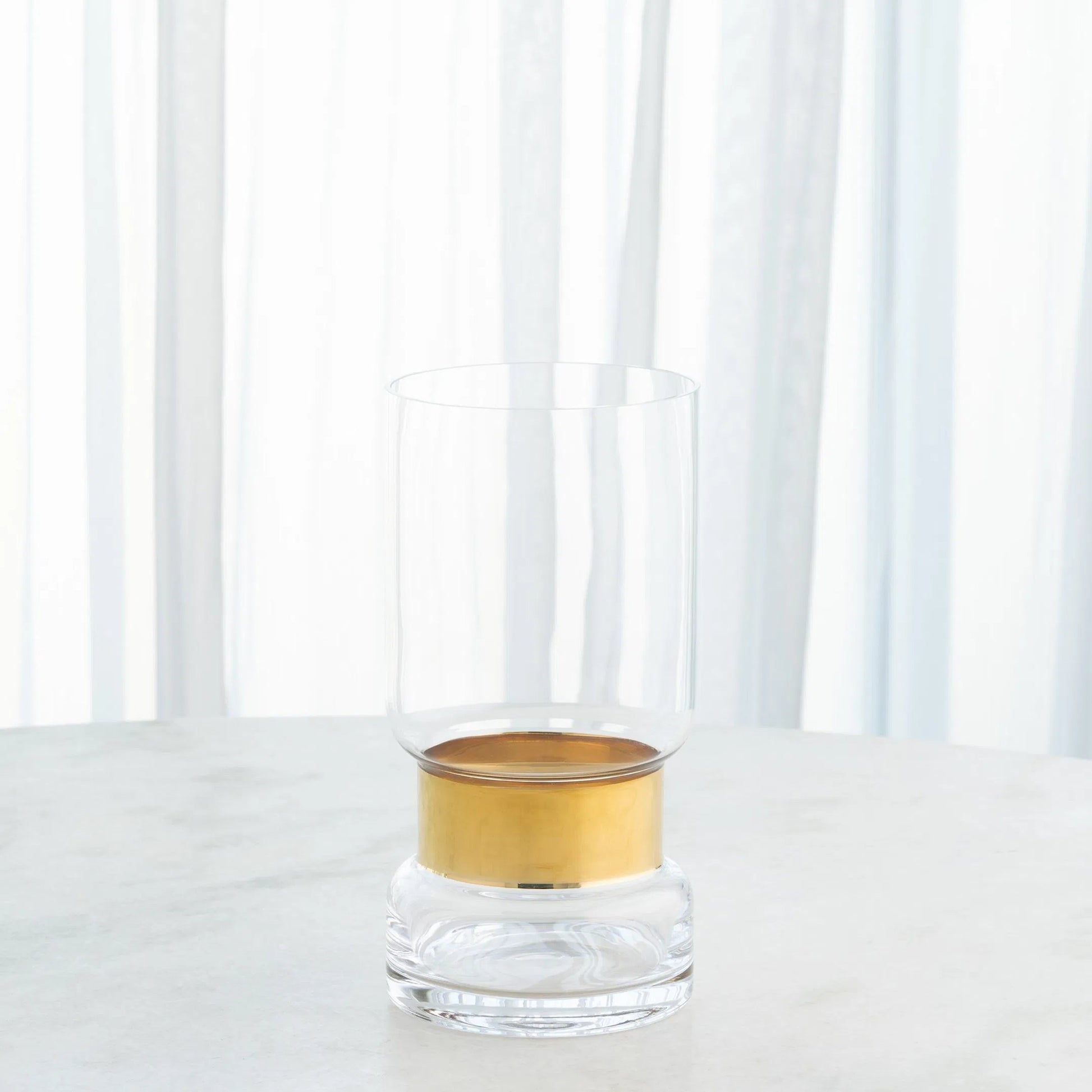 Belted Hurricane by Global Views. Made from glass in a modern style.
