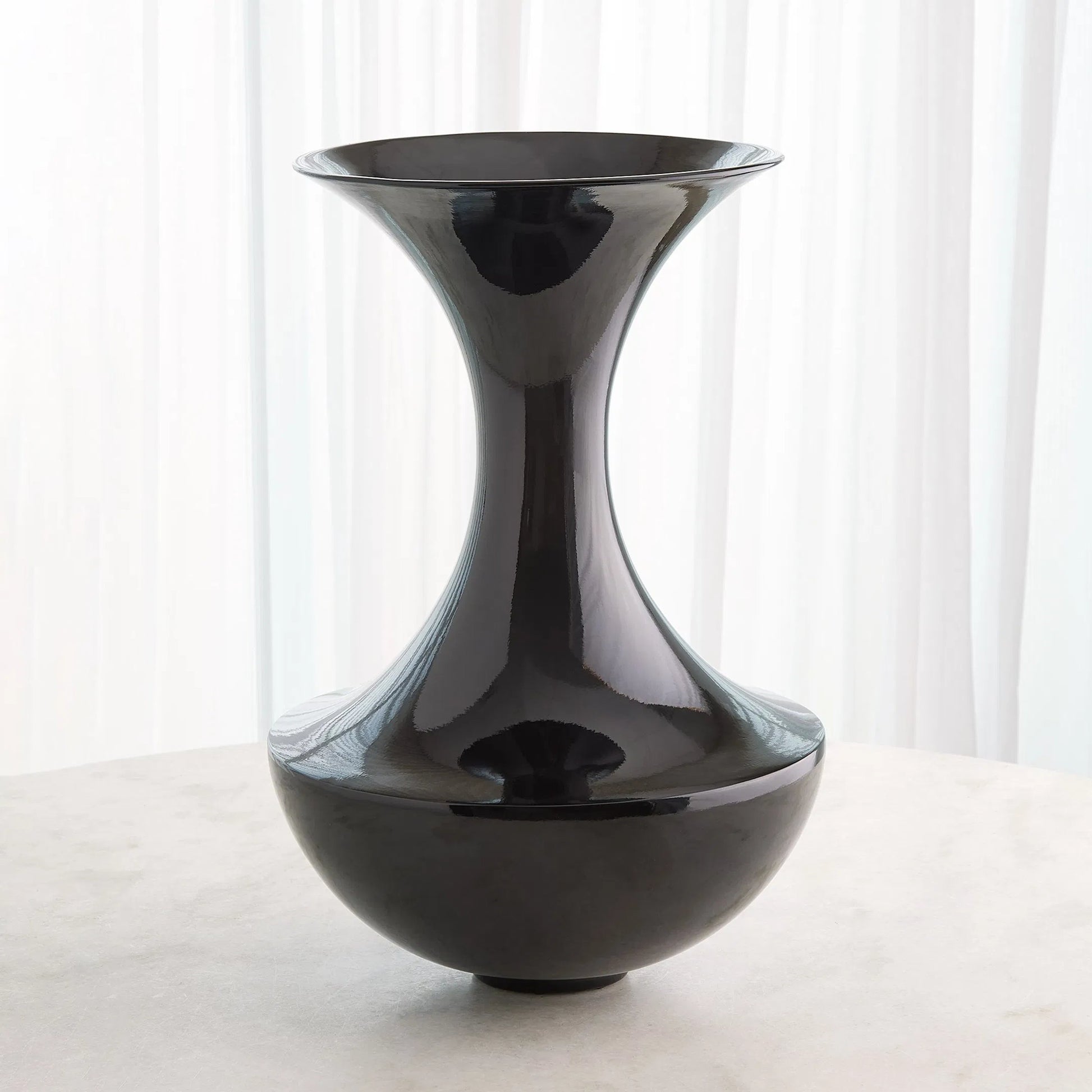 Trumpet Vase by Global Views. Made from ceramic in a modern style.