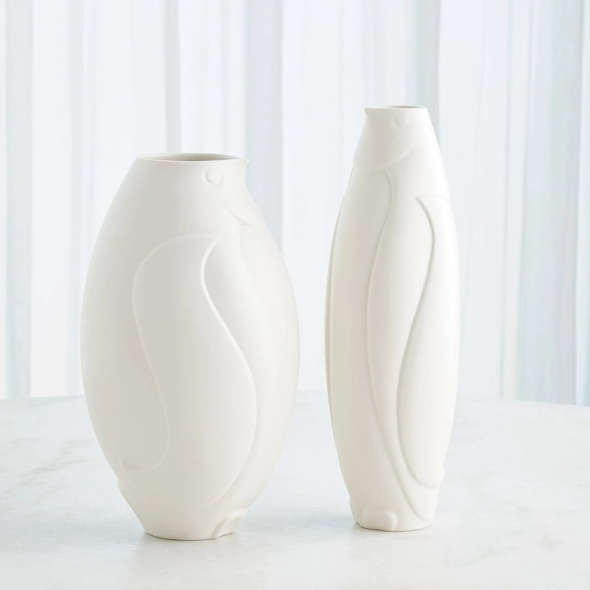 Penguin Vase by Global Views. Made from ceramic in a modern style.