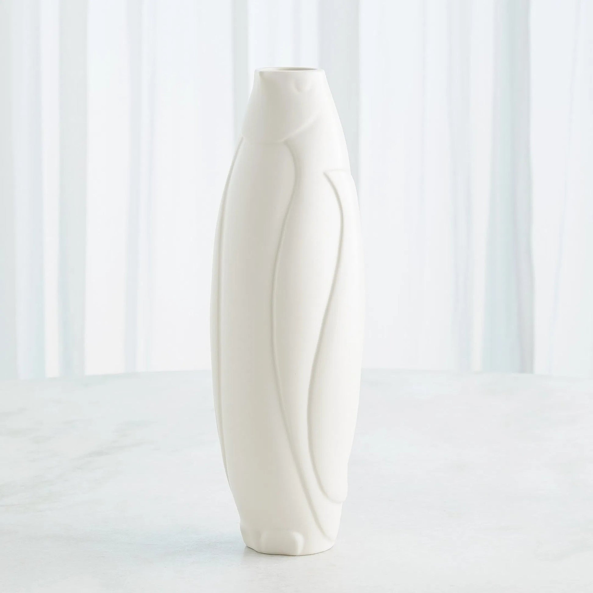 Penguin Vase by Global Views. Made from ceramic in a modern style.