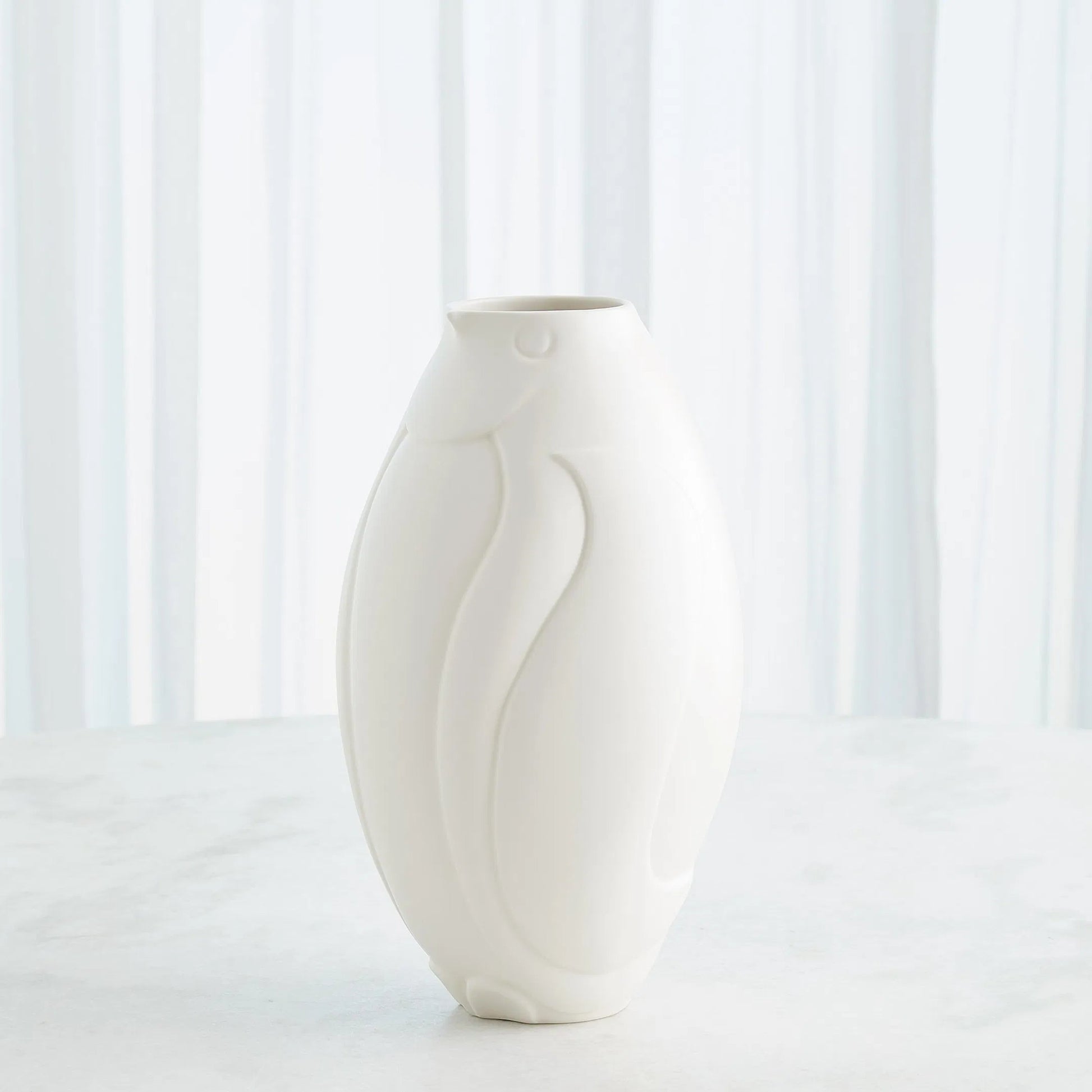 Penguin Vase by Global Views. Made from ceramic in a modern style.