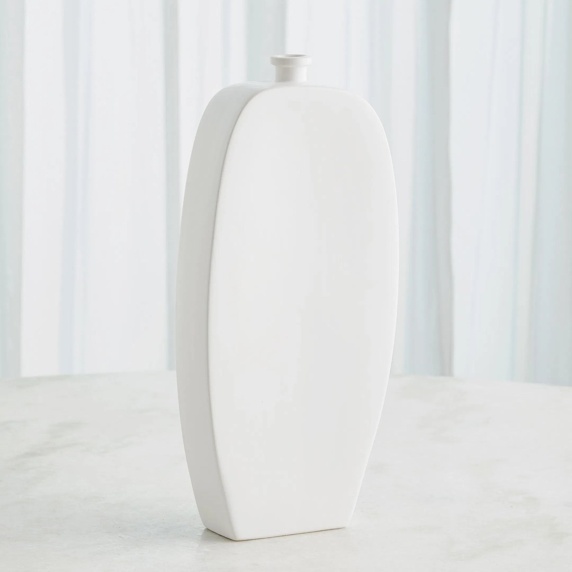 Bridwell Tall Bottle by Global Views in matte white. Made from ceramic in a modern style.