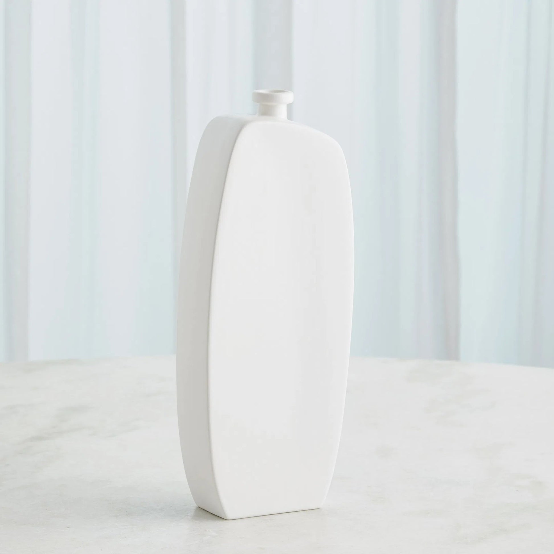 Bridwell Tall Bottle by Global Views in matte white. Made from ceramic in a modern style.