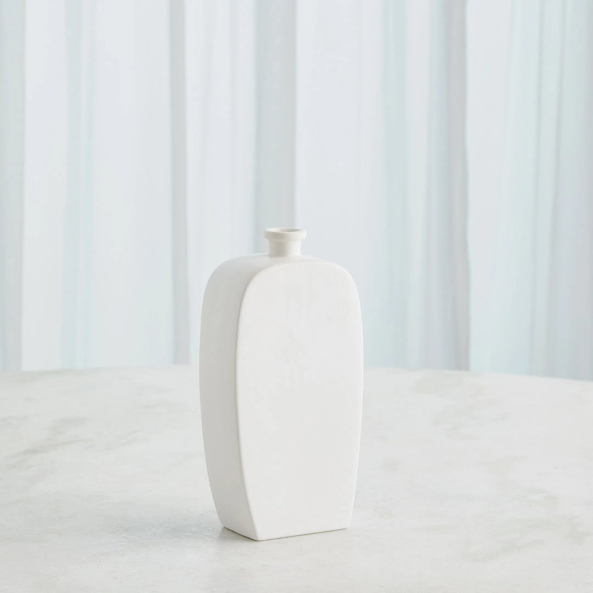 Bridwell Tall Bottle by Global Views in matte white. Made from ceramic in a modern style.