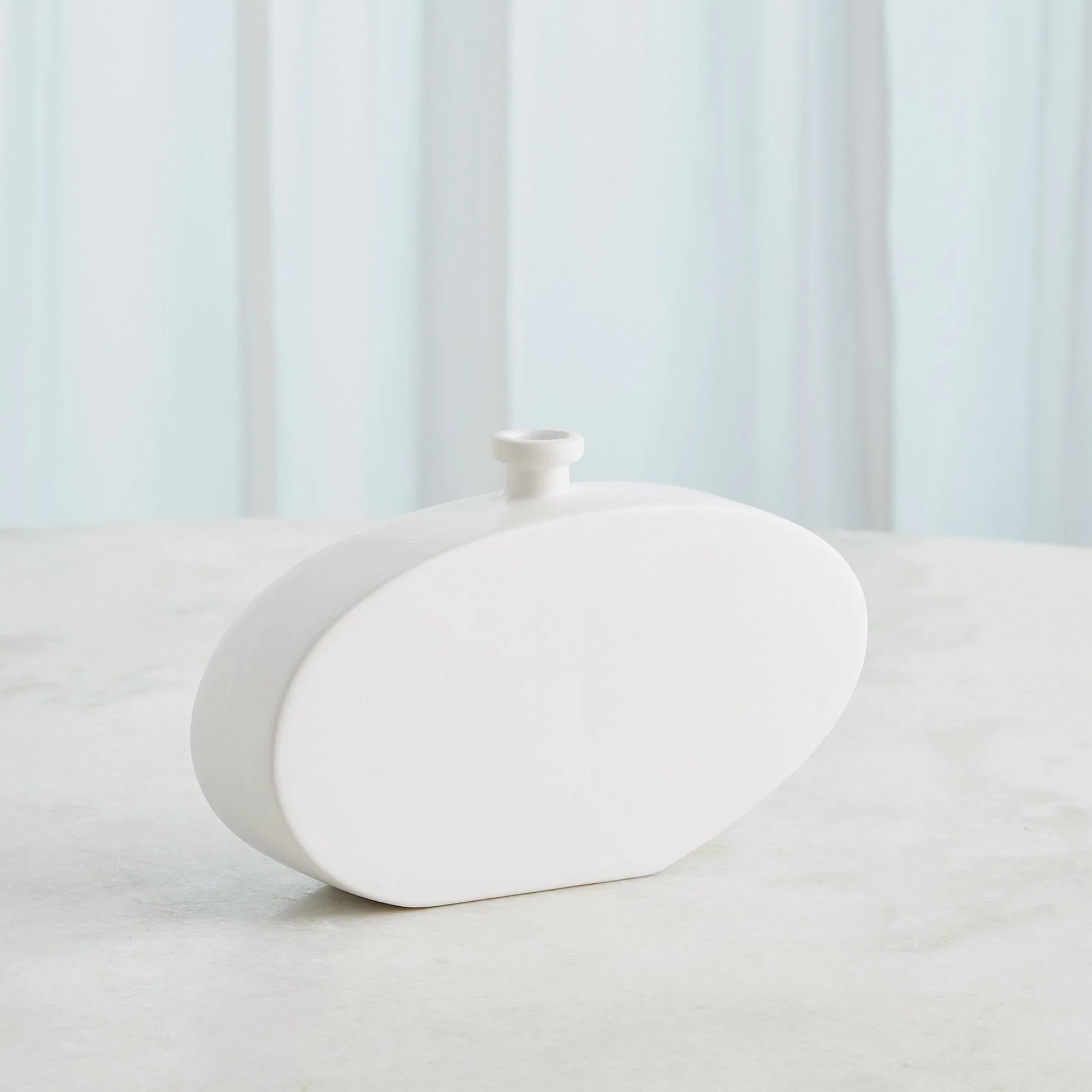 Bridwell Tall Bottle by Global Views in matte white. Made from ceramic in a modern style.