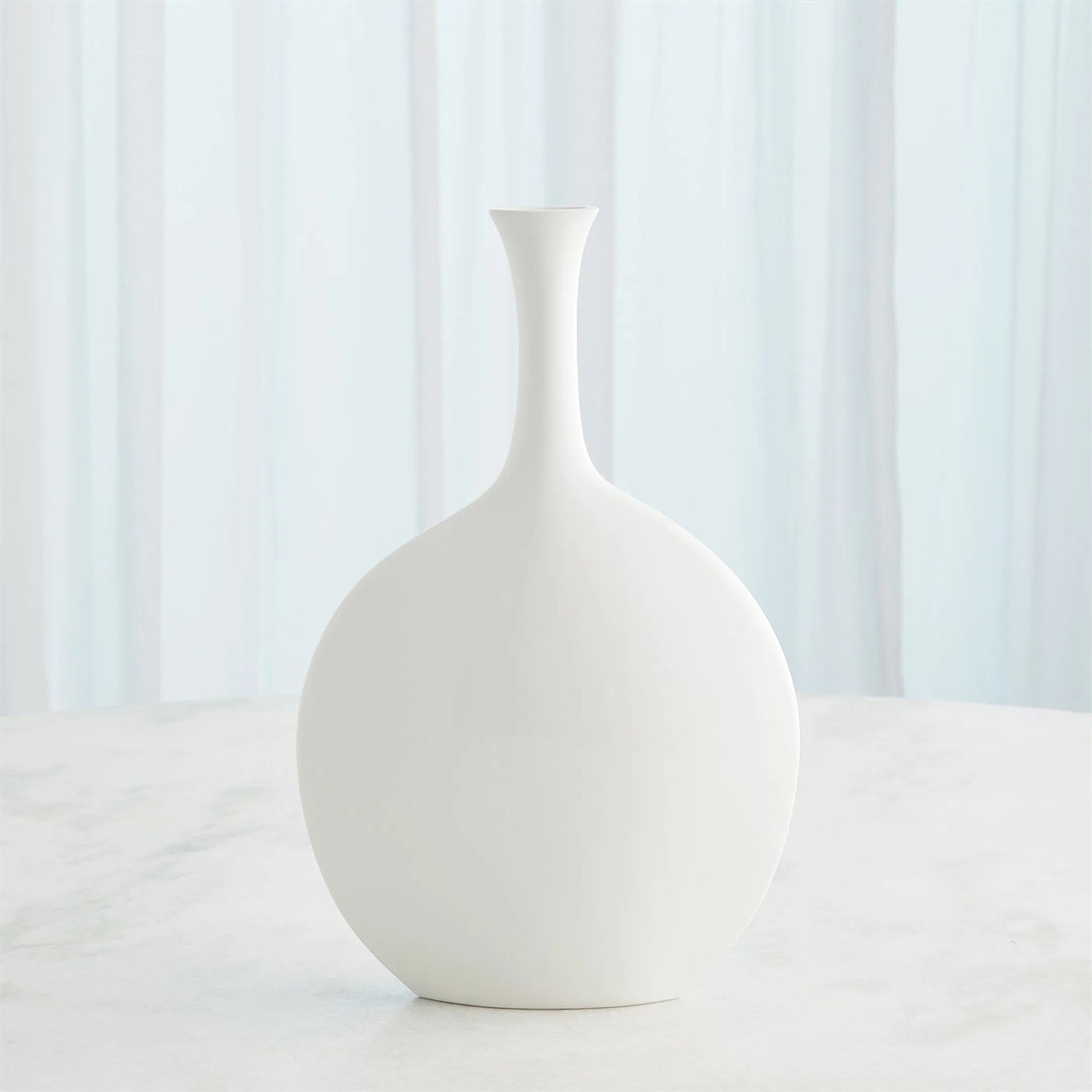 Silhouette Vase by Global Views. Made from ceramic in a modern style.