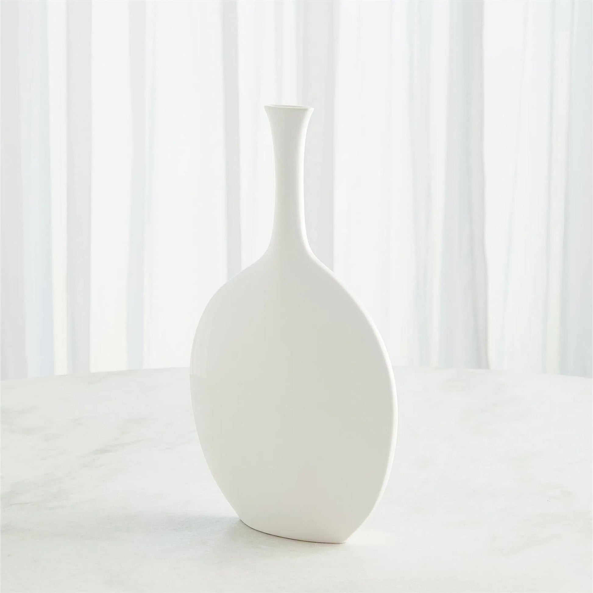 Silhouette Vase by Global Views. Made from ceramic in a modern style.